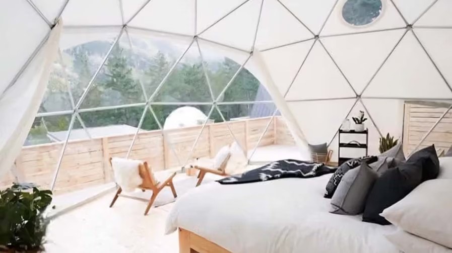 Glass dome bedroom with forest view at Holistic Eco-Resort