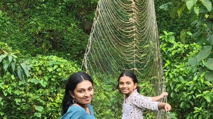 Rope bridge adventure with mother and daughter